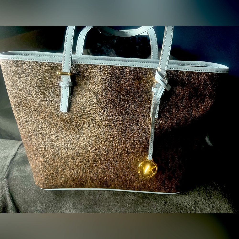 Michael Kors Tote Bag. Never used!! Beautiful Brown logo bag with blue accents